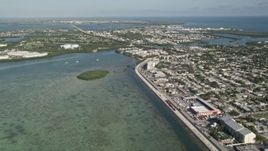 5K aerial stock footage of flying by North Roosevelt Boulevard, reveal Stock Island, Key West, Florida Aerial Stock Footage | AX0027_029