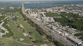 5K aerial stock footage of following Overseas Highway through Stock Island, Key West, Florida Aerial Stock Footage | AX0027_031