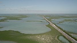 5K aerial stock footage of following Overseas Highway, Saddlebunch Keys, Florida Aerial Stock Footage | AX0027_045E