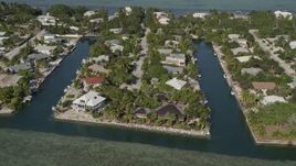 5K aerial stock footage of approaching homes on the island shore, Lower Sugarloaf Key, Florida Aerial Stock Footage | AX0027_050