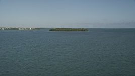 5K aerial stock footage of flying low over Cudjoe Bay, toward mangroves, Cudjoe Key, Florida Aerial Stock Footage | AX0027_061