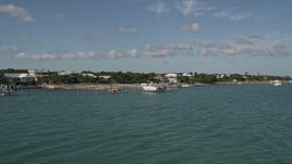 5K aerial stock footage of flying by homes and docks along the shore, Summerland Key, Florida Aerial Stock Footage | AX0027_072
