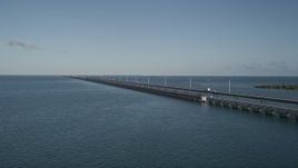 5K aerial stock footage of a truck on Seven Mile Bridge, Florida Aerial Stock Footage | AX0027_073E