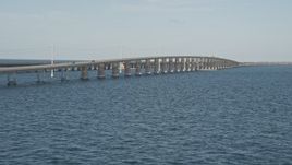 5K aerial stock footage of flying by a rise in Seven Mile Bridge, Florida Aerial Stock Footage | AX0027_080