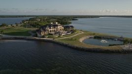 5K aerial stock footage of orbiting a mansion on the shore, Marathon, Florida Aerial Stock Footage | AX0028_005