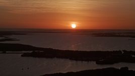 5K aerial stock footage of flying by bays and mangrove islands, Key Largo, Florida, sunset Aerial Stock Footage | AX0028_043E
