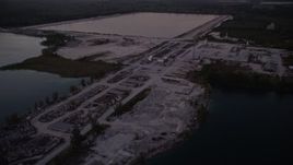 5K aerial stock footage of approaching quarry, Homestead, Florida, twilight Aerial Stock Footage | AX0028_060E