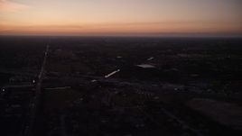 5K aerial stock footage of flying by strip mall, Homestead, Florida, twilight Aerial Stock Footage | AX0028_062