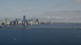 5K aerial stock footage of downtown skyline, Rickenbacker Causeway bridge, Miami, Florida, sunrise Aerial Stock Footage | AX0029_011