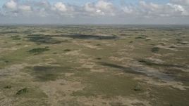 5K aerial stock footage of a wide view of the Florida Everglades, Florida Aerial Stock Footage | AX0030_055