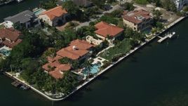 5K aerial stock footage of a mansion by a canal, Coral Gables, Florida Aerial Stock Footage | AX0031_013