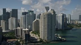 5K aerial stock footage of flying by Brickell Key, Downtown Miami skyscrapers, Miami, Florida Aerial Stock Footage | AX0031_025E