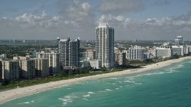 5K aerial stock footage of approaching Akoya Miami Beach Condo, Miami Beach, Florida Aerial Stock Footage | AX0031_063