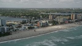 5K aerial stock footage of flying by the beach, Hollywood, Florida Aerial Stock Footage | AX0031_093