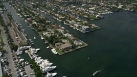 5K aerial stock footage of flying by mansions on the river, Fort Lauderdale, Florida Aerial Stock Footage | AX0031_110