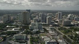 5K aerial stock footage of flying away from and orbiting downtown skyscrapers, Fort Lauderdale, Florida Aerial Stock Footage | AX0031_122E