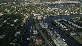 5K aerial stock footage of flying by residential neighborhoods and canals, Fort Lauderdale, Florida Aerial Stock Footage | AX0031_133