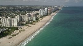 5K aerial stock footage of following the beach, Lauderdale by the Sea, Florida Aerial Stock Footage | AX0031_148