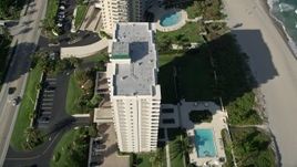 5K aerial stock footage of flying over coastal condominiums, Boca Raton, Florida Aerial Stock Footage | AX0032_022