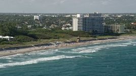 5K aerial stock footage flyby sunbathers on the beach, Delray Beach, Florida Aerial Stock Footage | AX0032_041