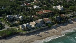 5K aerial stock footage flyby homes by the beach, Ocean Ridge, Florida Aerial Stock Footage | AX0032_051