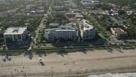 5K aerial stock footage of condominium complexes by the beach, Palm Beach, Florida Aerial Stock Footage | AX0032_079