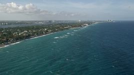 5K aerial stock footage of flying by the coast, Palm Beach, Florida Aerial Stock Footage | AX0032_104