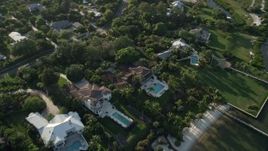 5K aerial stock footage of flying over homes on the shore, Saint Lucie Inlet, Stuart, Florida Aerial Stock Footage | AX0032_159