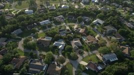 5K aerial stock footage of flying over residential neighborhood, tilt down, Stuart, Florida Aerial Stock Footage | AX0032_160