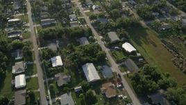 5K aerial stock footage of flying over a residential neighborhood, Stuart, Florida Aerial Stock Footage | AX0032_161