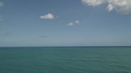 5K aerial stock footage of the ocean seen from Fort Pierce, Florida Aerial Stock Footage | AX0033_048E