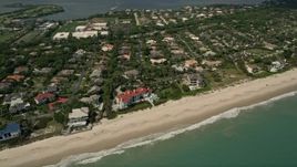 5K aerial stock footage fly away from a residential beachside neighborhood, Vero Beach, Florida Aerial Stock Footage | AX0033_057