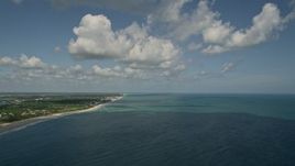 5K aerial stock footage of approaching the beach from high above the ocean, Vero Beach, Florida Aerial Stock Footage | AX0033_059