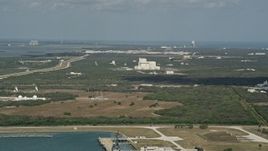 5K aerial stock footage of Cape Canaveral among trees, Florida Aerial Stock Footage | AX0034_015