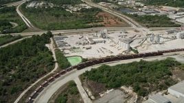 5K aerial stock footage video of approaching a quarry, Cocoa, Florida Aerial Stock Footage | AX0034_029