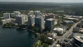 5K aerial stock footage of approaching condominium complex and office buildings, Downtown Orlando, Florida Aerial Stock Footage | AX0034_101E
