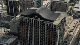 5K aerial stock footage of orbiting a high-rise apartment building, Downtown Orlando, Florida Aerial Stock Footage | AX0034_108