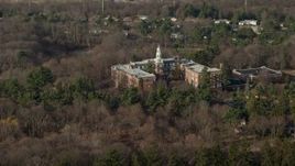 5K aerial stock footage of Our Lady of Mercy Academy in Syosset, Long Island, New York, winter Aerial Stock Footage | AX0065_0012