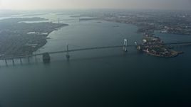 5K aerial stock footage approach Throgs Neck Bridge spanning the East River, Long Island, New York, winter Aerial Stock Footage | AX0065_0029
