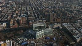 5K aerial stock footage of urban neighborhoods in Harlem and office buildings in Manhattanville, New York City, winter Aerial Stock Footage | AX0065_0051E