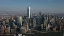 5K aerial stock footage of Freedom Tower, World Trade Center skyscrapers in Lower Manhattan, New York City, winter Aerial Stock Footage | AX0065_0070E