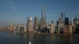 5K aerial stock footage of Freedom Tower and the skyline of the World Trade Center in Lower Manhattan, New York City, winter Aerial Stock Footage | AX0065_0087E
