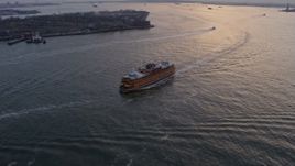 5K aerial stock footage track a Staten Island Ferry sailing New York Harbor, winter, twilight Aerial Stock Footage | AX0065_0181