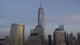 5K aerial stock footage flyby World Trade Center skyscrapers  and tilt to the top of Freedom Tower in New York City, winter, sunset Aerial Stock Footage | AX0065_0194E