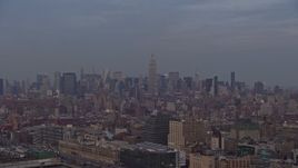 5K aerial stock footage of Midtown Manhattan skyline seen from Greenwich Village, New York City, winter, sunset Aerial Stock Footage | AX0065_0196