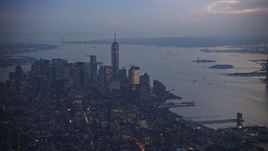 5K aerial stock footage of Freedom Tower, Lower Manhattan skyscrapers and New York Harbor, New York City, winter, twilight Aerial Stock Footage | AX0065_0242