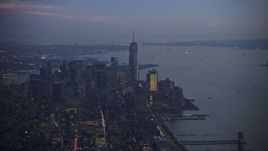 5K aerial stock footage of One World Trade Center, Lower Manhattan skyscrapers and New York Harbor, New York City, winter, twilight Aerial Stock Footage | AX0065_0243
