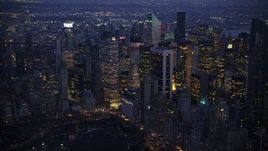 5K aerial stock footage of a large group of skyscrapers in Midtown Manhattan, New York City, winter, twilight Aerial Stock Footage | AX0065_0255