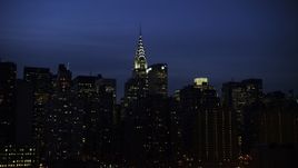 5K aerial stock footage of the Chrysler Building and surrounding skyscrapers, Midtown Manhattan, New York City, winter, night Aerial Stock Footage | AX0065_0272
