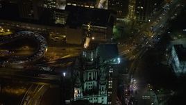 5K aerial stock footage orbit the top the Manhattan Municipal Building in Lower Manhattan, New York City, winter, night Aerial Stock Footage | AX0065_0292E